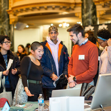Students meeting potential employers at CAPX's career fair