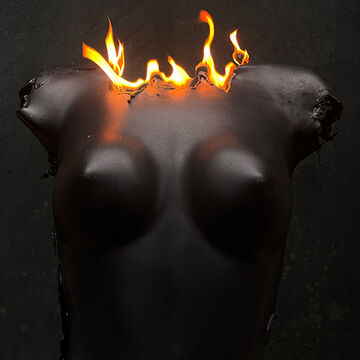 A female bust on fire
