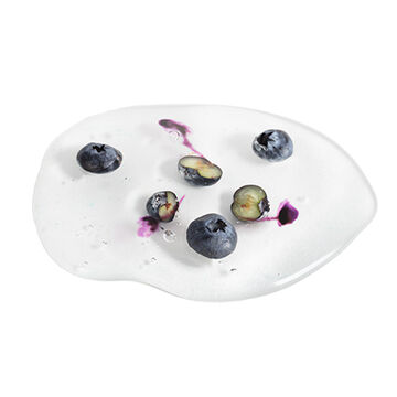 An image of a sculpture of blueberries on a clear acrylic base.