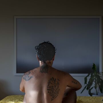 Image of tattoos on a person’s back