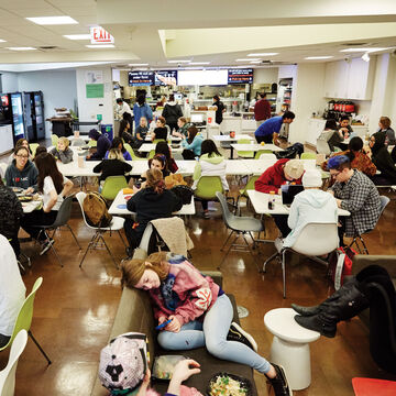 Students eating and resting in the cafeteria