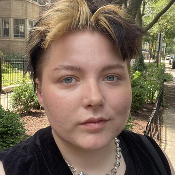 A selfie of a person outdoors