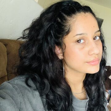 A selfie of a person indoors