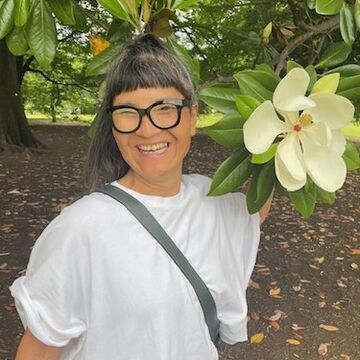 Portrait of a person smiling outdoors