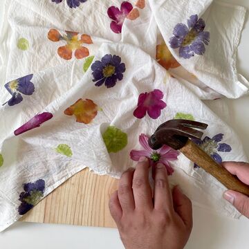 A photo of someone pounding flowers