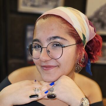 A headshot of SAIC RA Demi Sedrakyan