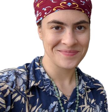 A picture of Azra Keskin smiling against a white background.