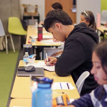 Students working in a classroom. 