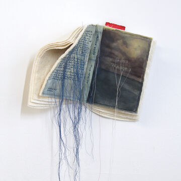Embroidered and printed fiber book