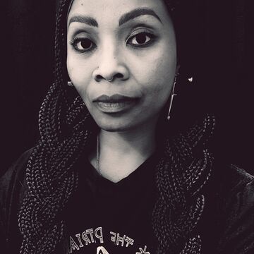 A black and white photo of indira allegra.