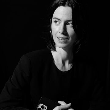 A black and white photo of Maura Brewer.