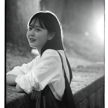 A black and white photo of student Millie Park.