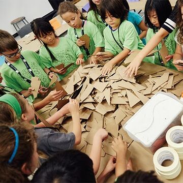 Group of students work together on a project