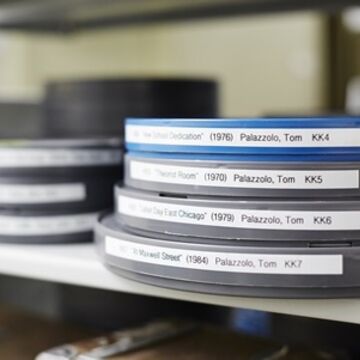 Shelves with archived reels of film