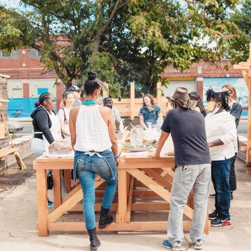 Participants on the Full Circle Workshop working at the site of Soil Lab’s Ceramic Workshop at the 2021 Chicago Architecture Biennial. 