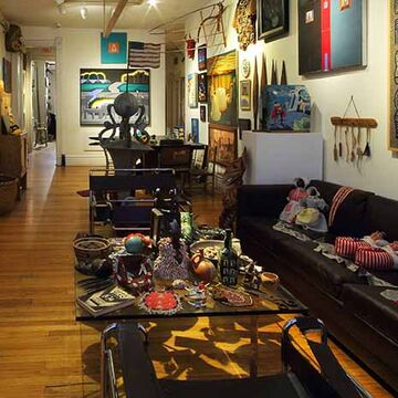 RBSC living room with Roger Brown's Gothic Stadium painting on view