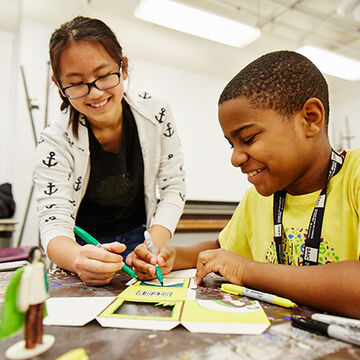Middle school students work on art project