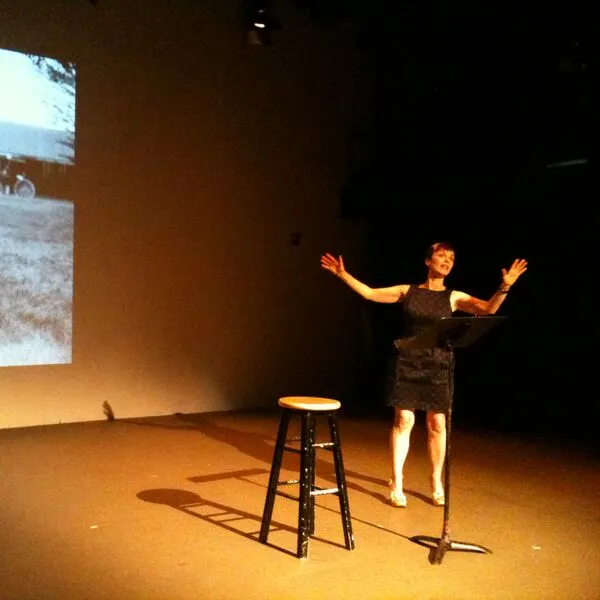 Photo of Holly Hughes during a performance.
