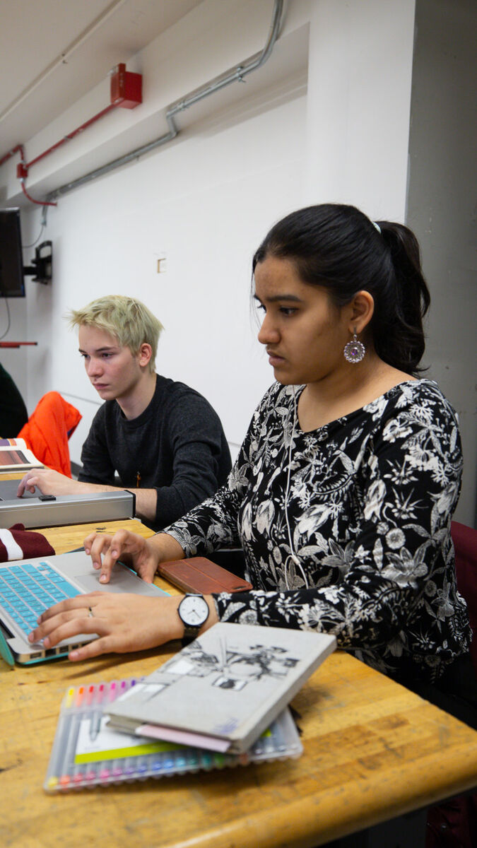 Students working on laptops