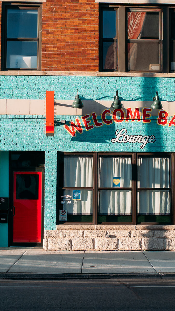 The street-facing front of a colorful bar in Logan Square