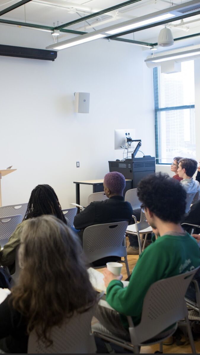 Roger Reeves speaking to a group of people