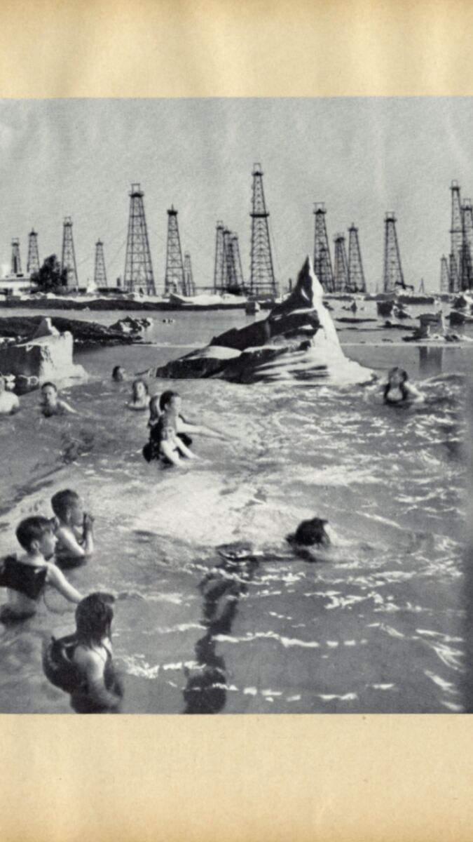 A black and white image of a beach.