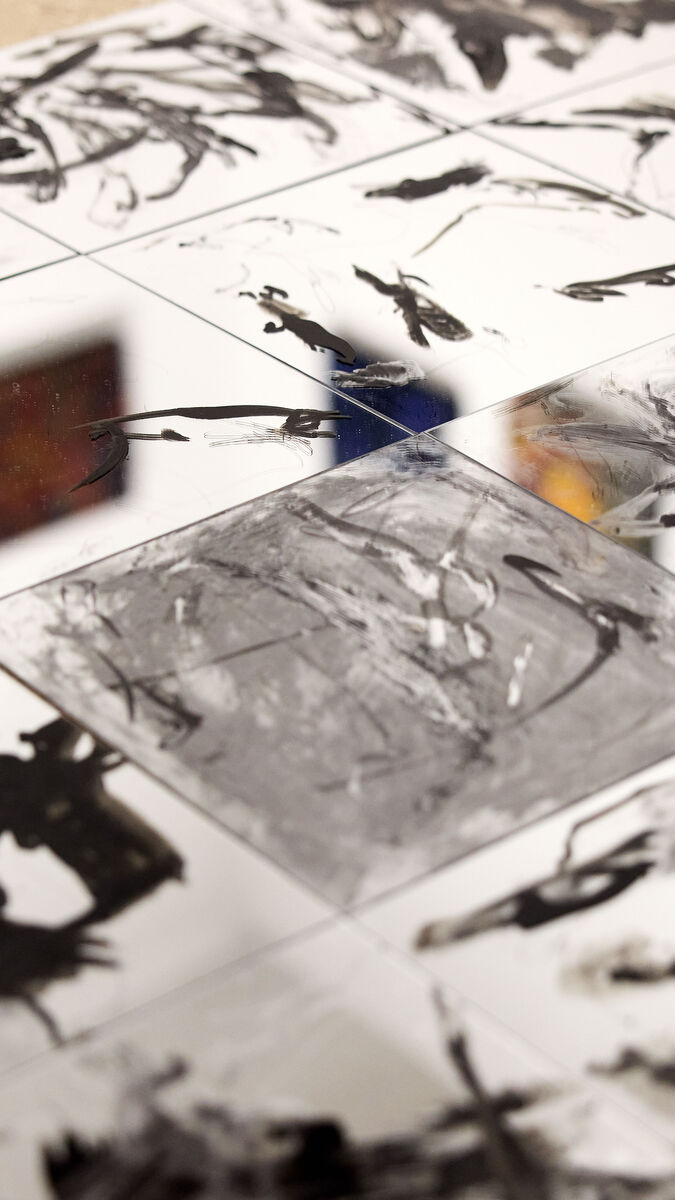 Detail of a reflective artwork by Lindsay Adams. 