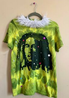 A green tie-dye Bob Marley shirt with buttons and a fur neckline