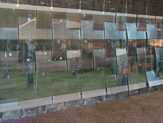 Art installation of an abstracted wall in a wooded area by Anders Nereim