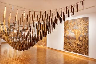 Three art installations by Anna Champman in a gallery space. 