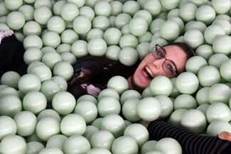 A CAAP student in a ball pit.