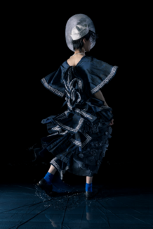 A model showcasing Jake Wobig's fashion designs.