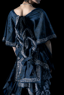 A model showcasing Jake Wobig's fashion designs.