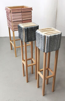 Three sculpted stools of varying heights and colors by Yasmin Spiro. 