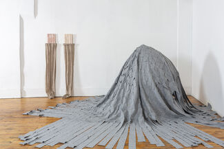 Gray abstract sculptural piece by Yasmin Spiro. 