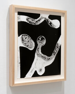 Framed geometric black and white print by James Baroz. 