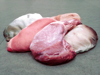 Pink sculpture that looks like raw meat.