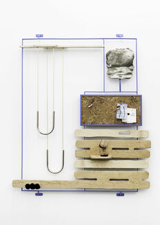 A wooden and metal sculpture.