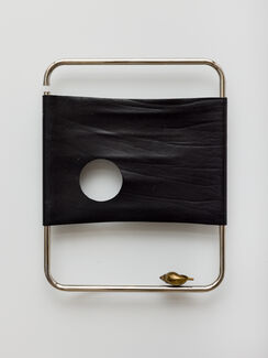 Leather stretched across a rectangular metal structure.