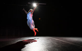 A performer on-stage dancing.