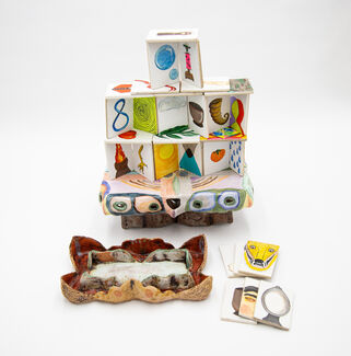 Three earthenware pieces in different colors and shapes.