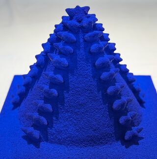 Bright blue and spiky cone-shaped sculpture by Gunjan Chawla Kumar. 