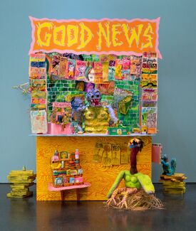 A sculptural piece by Molly Colleen O'Connell of various critters at a news stand. 