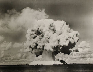 Black and white photo of a mushroom cloud