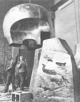 Black and white photo of Henry Moore in process of building the nuclear energy sculpture