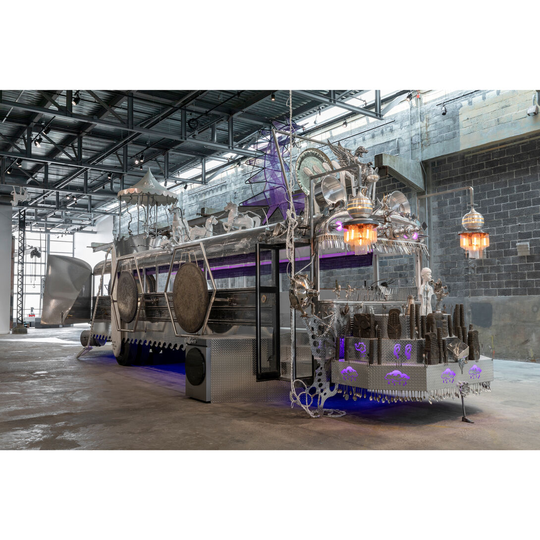 A sculpture inside an industrial space