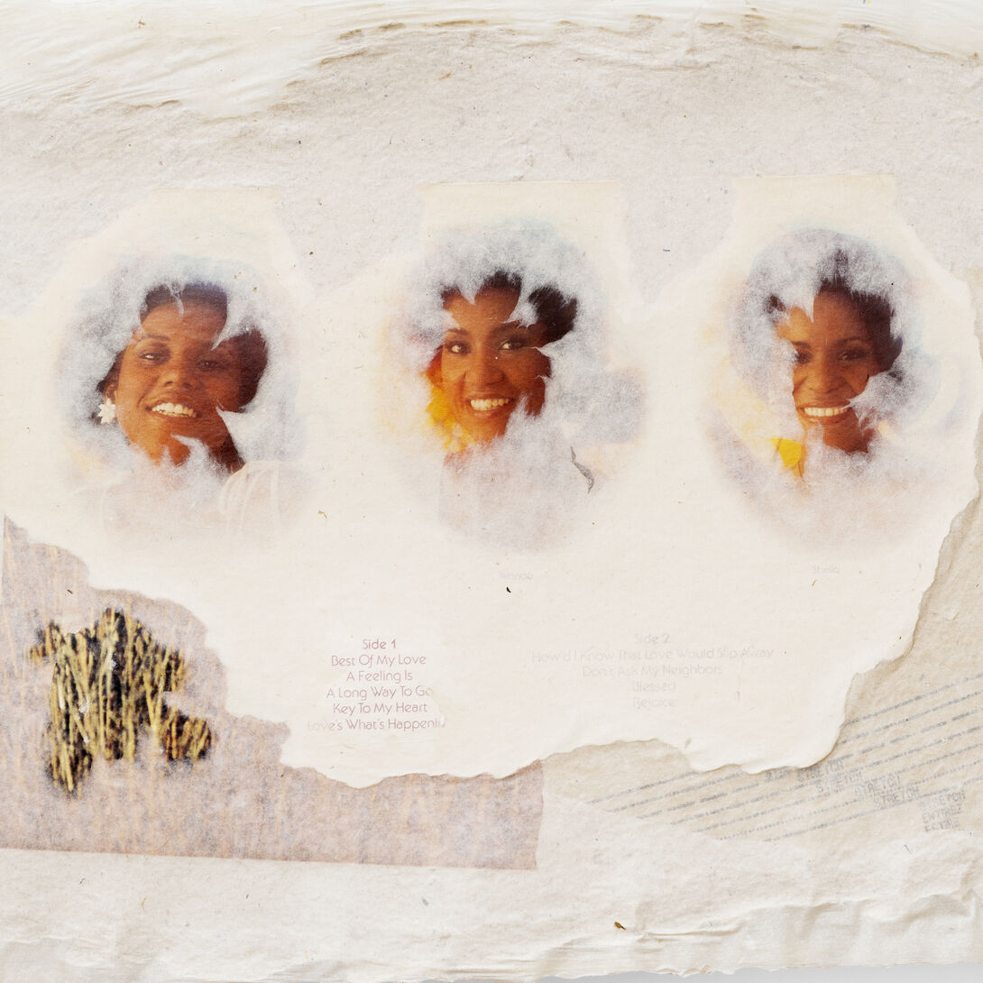 Cream-colored handmade paper embedded with 3 images of smiling Black women and other collaged paper.