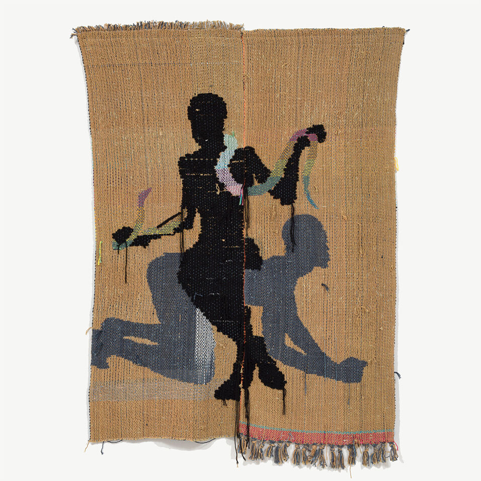 A tapestry weaving with tan background behind a black silhouetted figure with a colorful snack around the neck sits atop the back of a grey silhouetted figure on their hands and knees.
