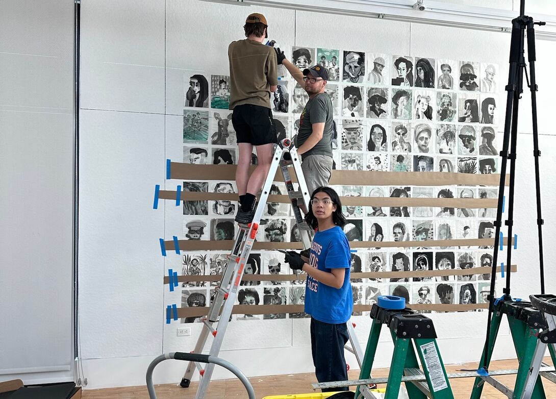 students installing artwork at Joan Mitchell Center