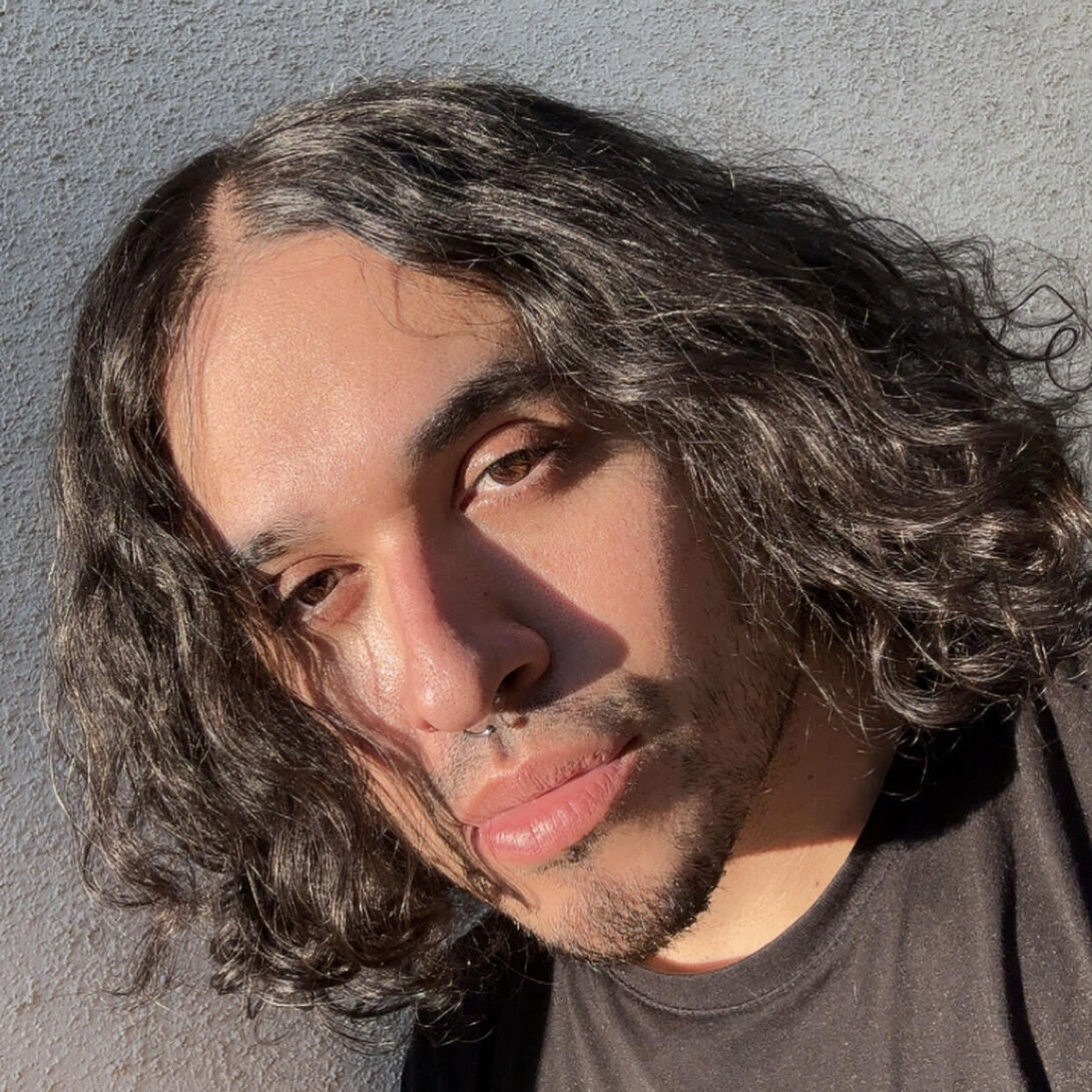 A headshot of Alberto Ponce